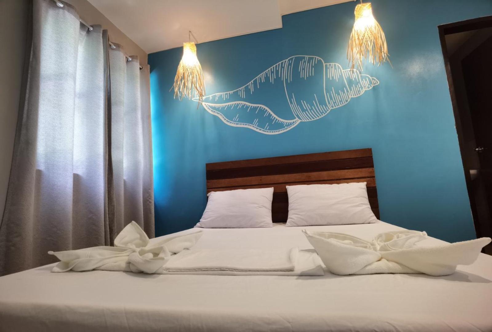 Amos Pili Tree Inn Powered By Cocotel El Nido Rom bilde